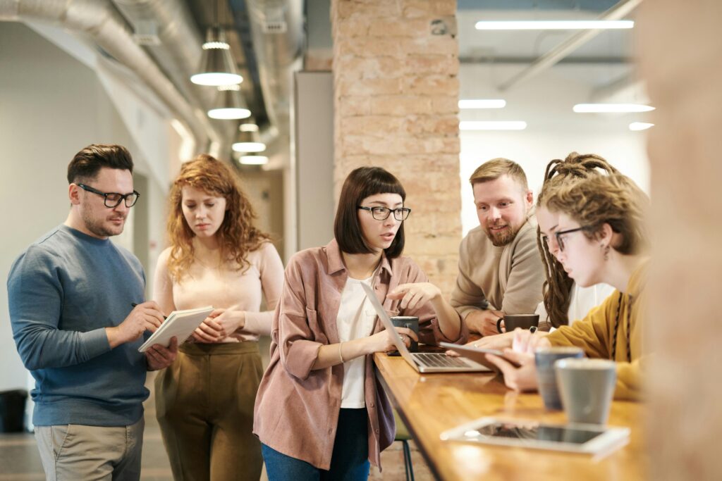 Team meeting in an open workspace.